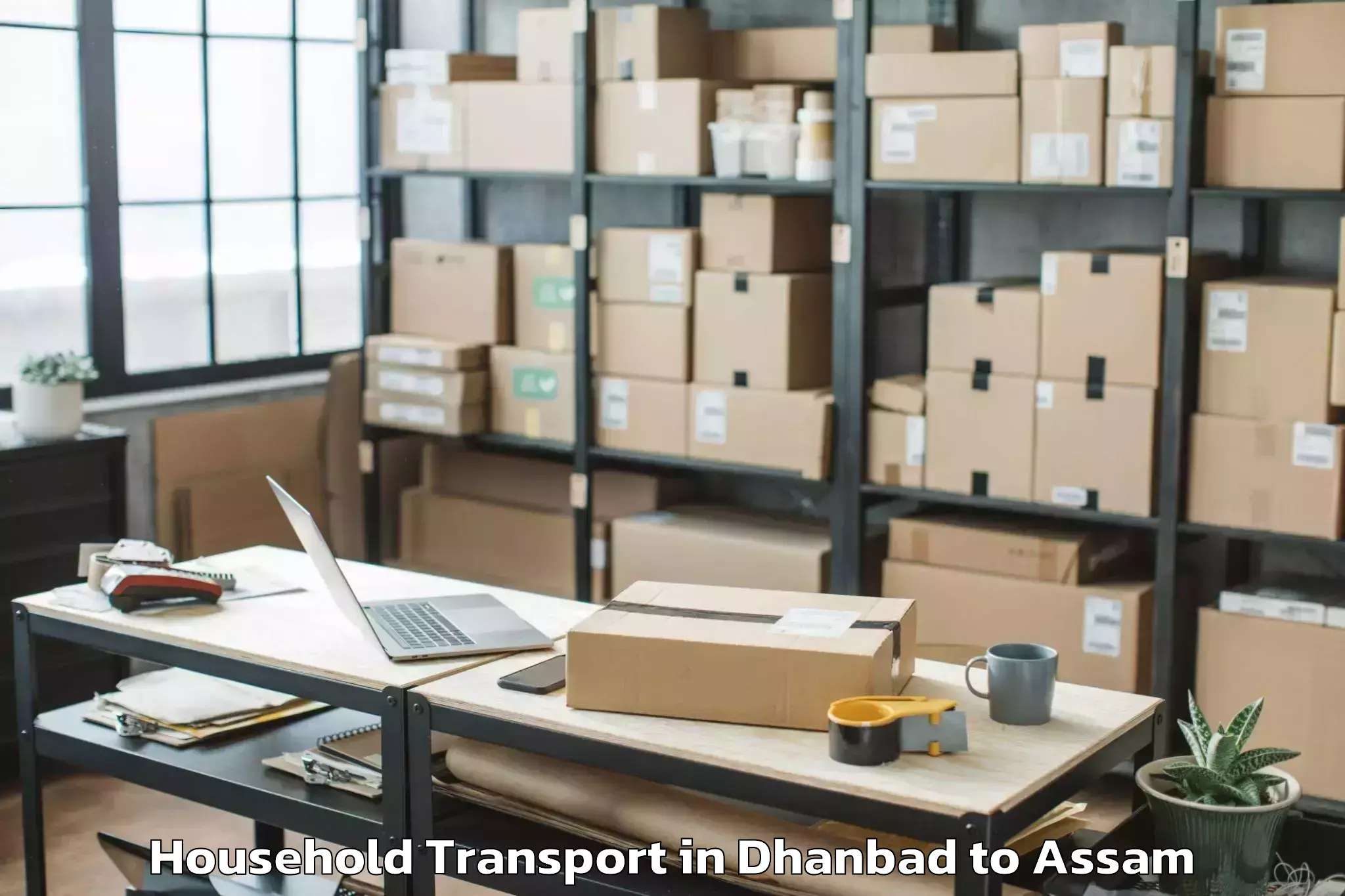 Affordable Dhanbad to Namrup Household Transport